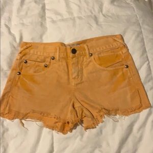 Free people orange cutoff shorts